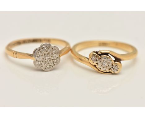 TWO DIAMOND RINGS, the first a seven stone floral cluster ring, stamped 18ct Plat, ring size K 1/2 , the second a three stone