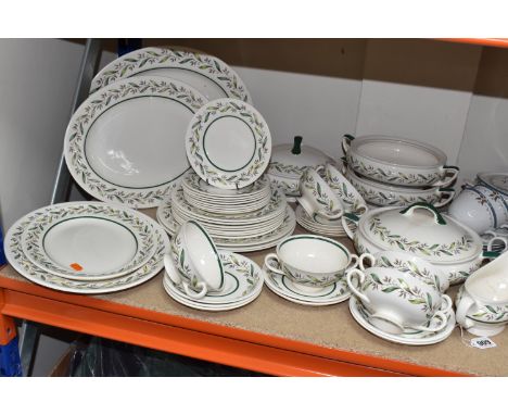 ROYAL DOULTON DINNERWARE, comprising 'Almond Willow', D6373, Rd. No.32008, oval meat plates, covered tureens, plates, handled