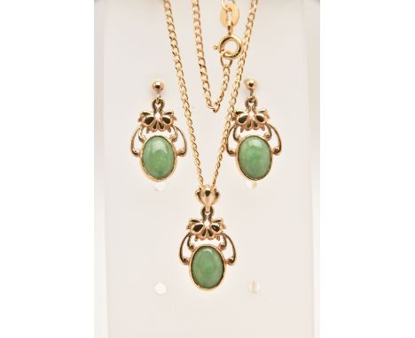 A JADE PENDANT NECKLACE WITH MATCHING EARRINGS, the pendant set with an oval jade cabochon, collet set to the open work surmo