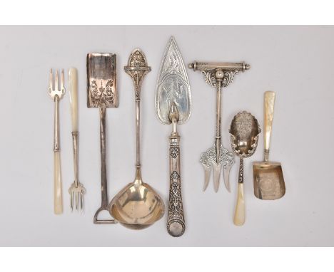 A BAG OF ASSORTED CUTLERY PIECES, to include a late 19th Century Gorham silver ladle, 31.7 grams, a silver trident bread fork