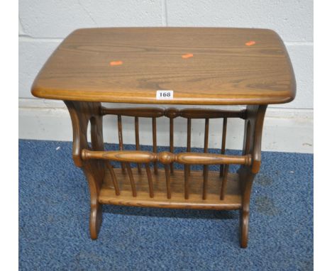 LUCIAN ERCOLANI, AN ERCOL MID CENTURY ELM AND BEECH MAGAZINE RACK, width 55cm x depth 36cm x height 50cm, condition report: o