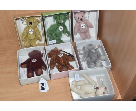 A GROUP OF SEVEN BOXED STEIFF ANNUAL CLUB GIFT BEARS to include a 2012 burgundy bear, a 2013 rose-coloured bear, a 2014 green