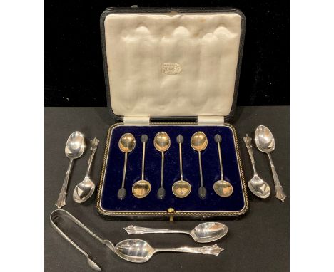 A set of six silver and enamel coffee spoons, bean terminals, Birmingham 1928, cased; a set of six silver teaspoons, Sheffiel