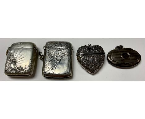 An Edwardian silver oval engine turned snuff box, suspension loop, vacant cartouche, 4.5cm wide, Chester 1909; a sterling sil