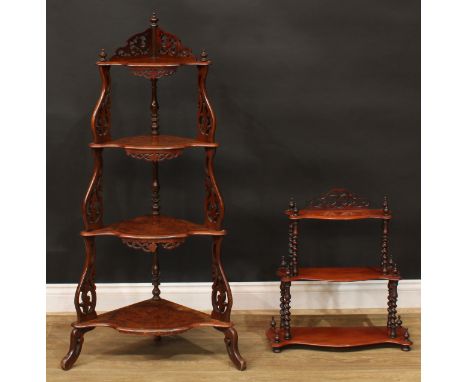 A Victorian walnut four-tier corner whatnot, 127.5cm high, 68cm wide, 38cm deep; a similar serpentine waterfall shelf, 59cm h