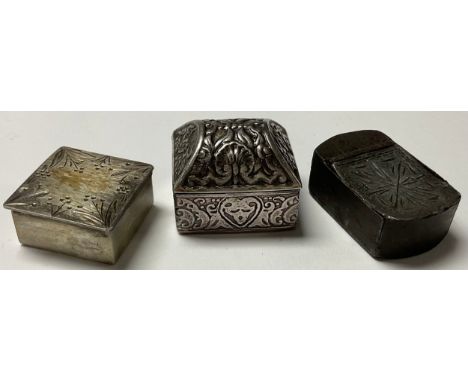 An 18th century steel snuff box, bright cut, hinged cover, 3.5cm wide; an early 20th century sterling silver square snuff/pil