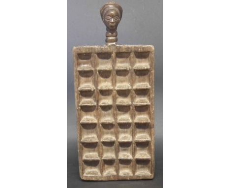 Luba or Hemba Mankala game board, 56cm long     All lots in this Tribal and African Art Sale are sold subject to V.A.T. There