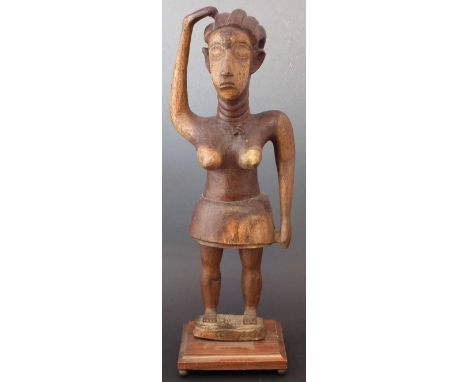 Female figure possibly Bassa, 57cm high     All lots in this Tribal and African Art Sale are sold subject to V.A.T. Therefore