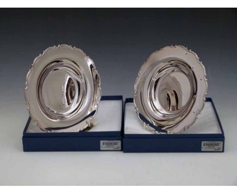 Two sterling silver 20cm plates, 2006, approx 300g each Condition report: see terms and conditions
This lot is sold subject t