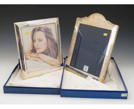 Two large sterling silver mounted photo frames for 10"x8" prints Condition report: see terms and conditions
This lot is sold 