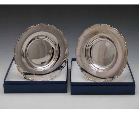 Two sterling silver 20cm plates, 2006, approx 300g each Condition report: see terms and conditions
This lot is sold subject t