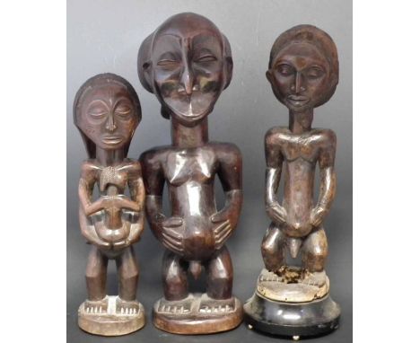 Three Luba / Hemba figures, the largest measures 66cm high.    All lots in this Tribal and African Art Sale are sold subject 