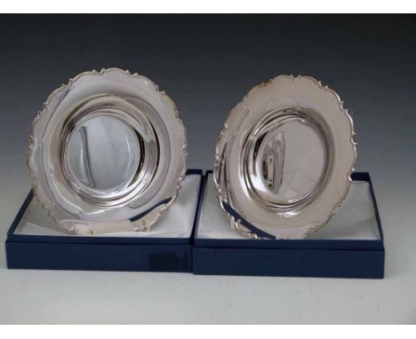 Two sterling silver 20cm plates, 2006, approx 300g each Condition report: see terms and conditions
This lot is sold subject t