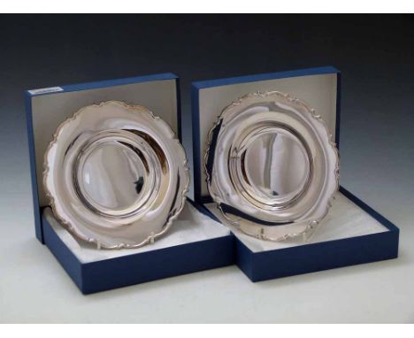 Two sterling silver 20cm plates, 2006, approx 300g each Condition report: see terms and conditions
This lot is sold subject t