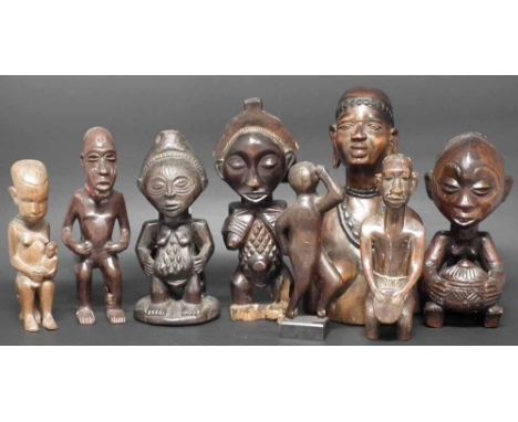 Three Luba / Hemba figures and five other figures carved in various tribal  styles, the tallest measures 31cm high      All l
