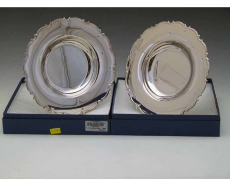 Two sterling silver 20cm plates, 2006, approx 300g each Condition report: see terms and conditions
This lot is sold subject t