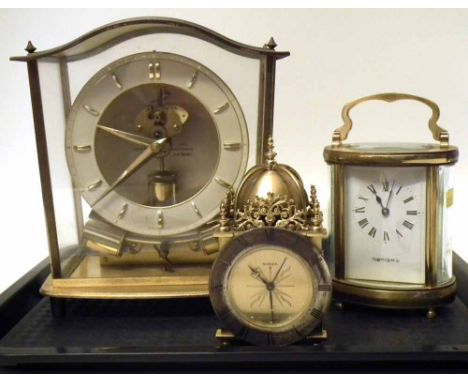 Mappin & Webb oval cased carriage clock, Junghans Anticlimatic battery clock, miniature lantern clock. Condition report: see 