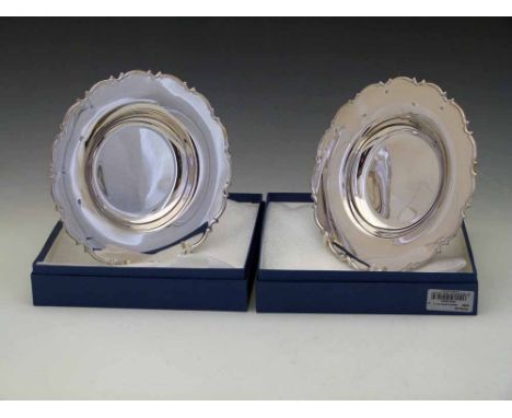 Two sterling silver 20cm plates, 2006, approx 300g each Condition report: see terms and conditions
This lot is sold subject t