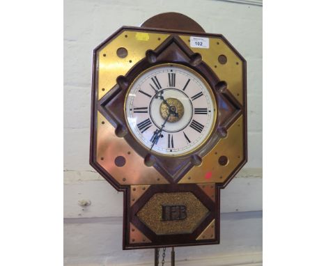 A brass and mahogany cased drop dial clock, the 19th century dial and movement with alarm dial, within a later canted square 