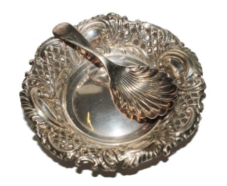 A silver bonbon dish with pierced decoration and a plated caddy spoon