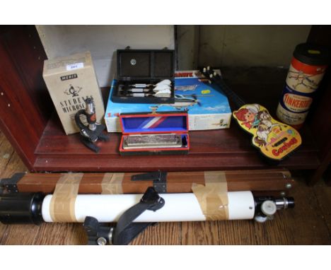 A Prinz Astromical telescope, Hohner harmonica, student microscope, darts and other collectables