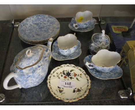 A dolls house blue and white tea service with teapot, and three cups, saucers and plates, a Shelley Chelsea pattern dish and 