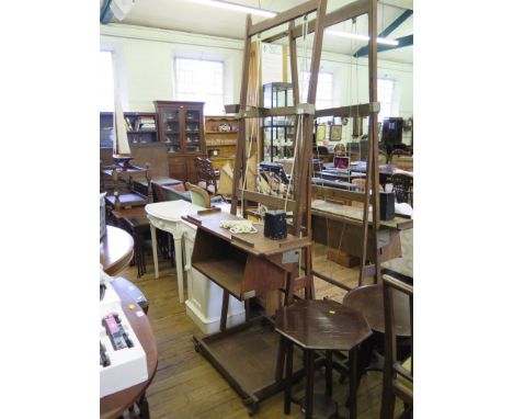 An oak artist's easel with counterweighted adjustable shelf, 91cm wide, 210cm high