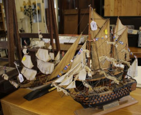 A scale model of HMS Victory, Trafalgar 200 edition, the base made from timber recovered from HMS Victory 44cm long, a scale 