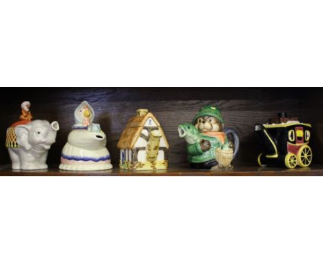 Seven novelty teapots by Bob Hersey and another novelty teapot (8)