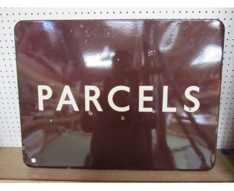 A B.R. (W) full flanged enamel PARCELS station sign, some chipping to edges
