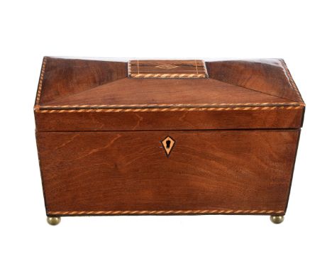 ϒ A George III mahogany, rosewood and inlaid tea caddy, circa 1810, sarcophagus form, with box and fruitwood stringing to the