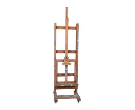 A pine artist's easel, 20th century, probably Windsor &amp; Newton, the shaft with applied metal plaque 'By Appointment', 210