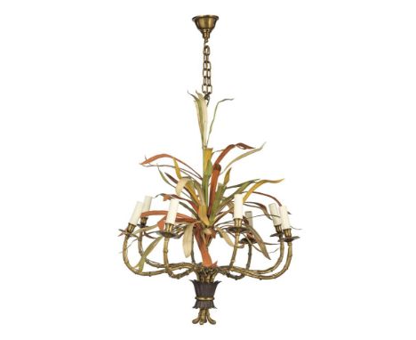 A gilt metal and pressed and painted sheet iron eight light chandelier, late 20th century, by Maison Baguès, approximately 72