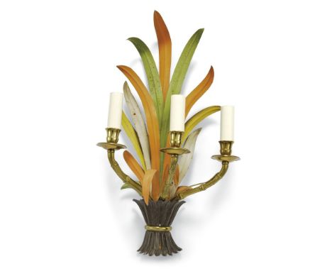 A pair of gilt metal and pressed and painted sheet iron three light wall appliques, late 20th century, by Maison Baguès, the 