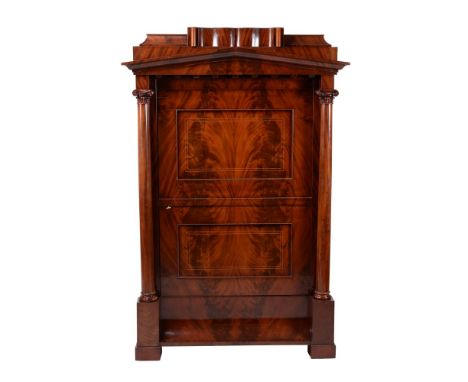 A French flame mahogany wardrobe, late 19th century and later, of architectural form, the stepped cornice with blind frieze d