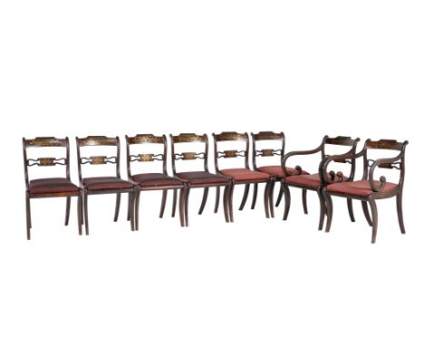 A set of eight Regency simulated rosewood and brass inlaid dining chairs, circa 1815, to include a pair of armchairs Please n