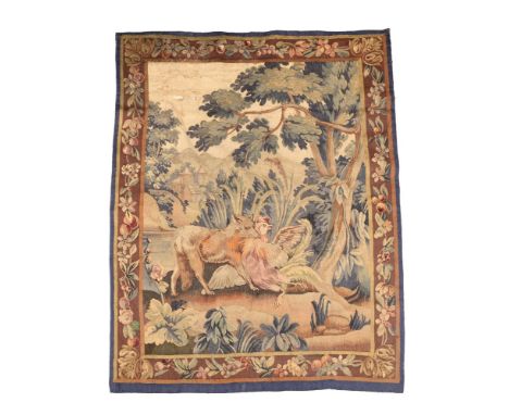 A Flemish verdure tapestry panel, late 17th/early 18th century, woven in wool and silk, the rectangular field with a fox maul