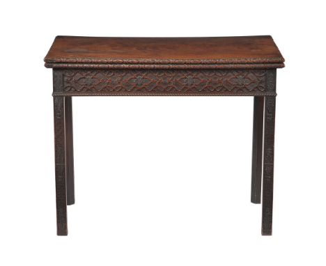 A George III mahogany card table, circa 1770, in the manner of Thomas Chippendale, with blind fretwork carved frieze and legs