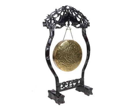 A Chinese lacquered hardwood dinner gong, first half 20th century, 107cm high, 65cm wide      Provenance: Hambrook House, Glo