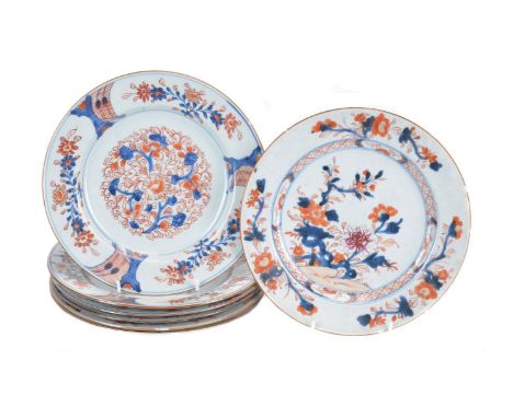 A set of six Chinese Imari plates, Kangxi, painted with central flower head and scrolls, 22.7cm diameter and another Chinese 