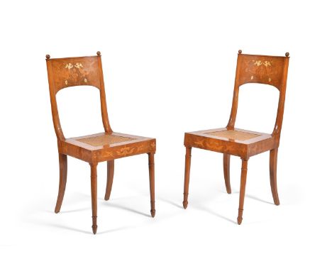 ϒA set of six Italian walnut, bone and marquetry chairs, first half 19th century, each shaped back incorporating a winged put