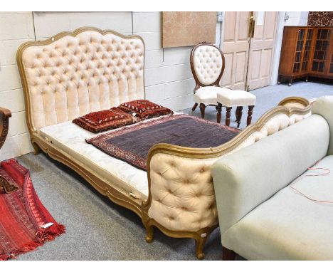 A Gilt Framed Double Bedstead, in the French Taste, with button back headboard, 152cm by 208cm 124cmStructurally sound. Some 