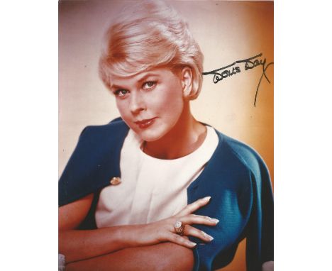 Doris Day signed stunning 10 x 8 inch colour portrait photo. Good Condition. All autographed items are genuine hand signed an