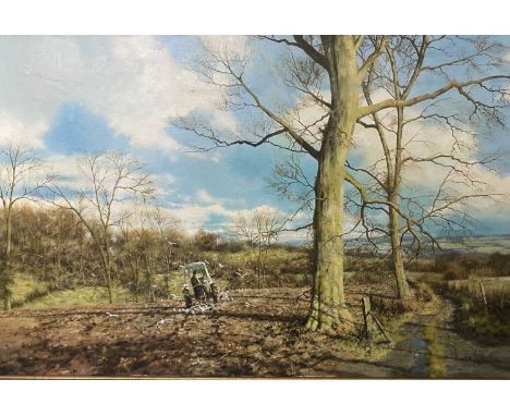 ‡ TONY WOODING (British) oil on canvas - early spring view of a farmer in a tractor ploughing a field, signed and dated '95 l