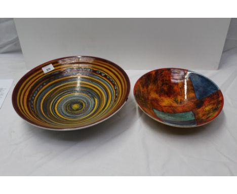 Large Poole circular bowl with banded decoration, another Poole bowl and three Poole Aegean shaped dishes (Qty: 5)