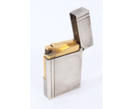 Silver Dupont lighter with engine turned decoration, signed S T Dupont Paris and numbered 13 E K S 9 2, 55mm