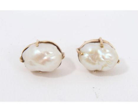Pair Baroque pearl earrings with yellow metal mounts