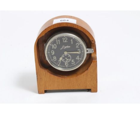 Second World War Luftwaffe cockpit clock by Junghans with black dial, luminous Arabic numerals and hands, subsidiary seconds,