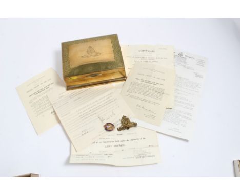 Second World War brass cigarette box engraved with Royal Artillery regimental badge, together with military papers and an emb