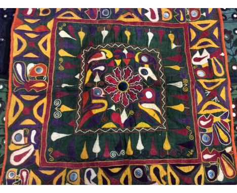 Indian and Banjara textiles including toran door hangings, panel and a woven wedding belt.